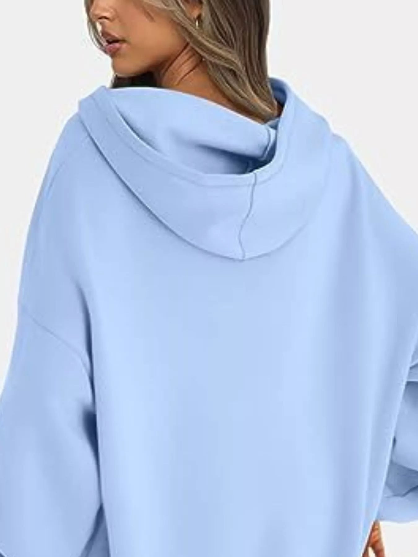 Sweat à capuche à manches longues et épaules tombantes