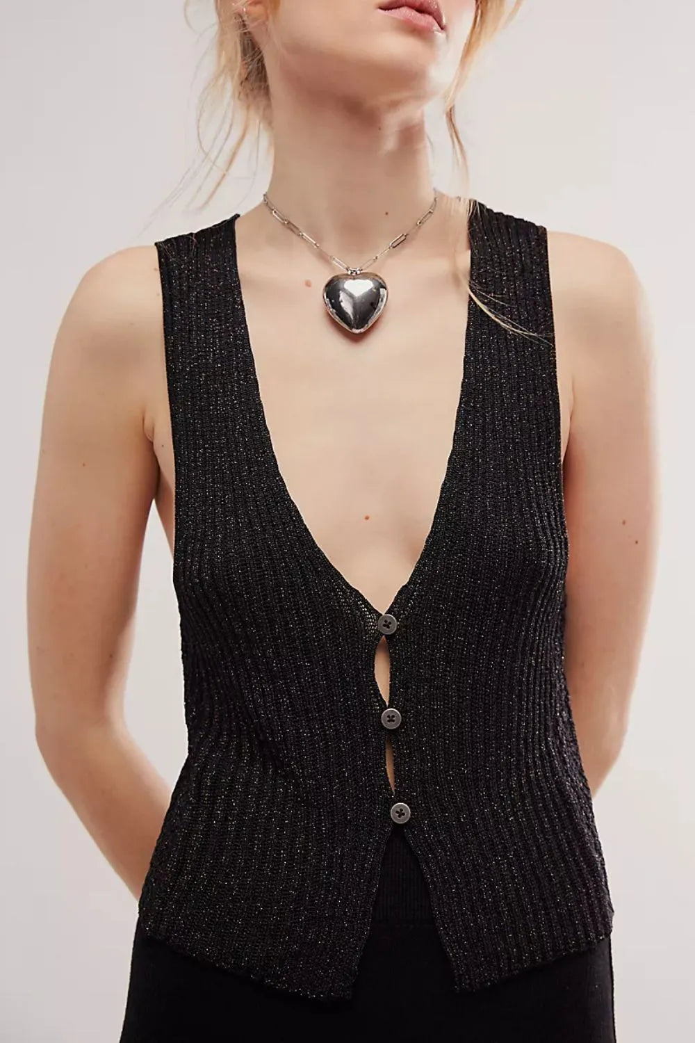 Gilet sans manches à col en V boutonné